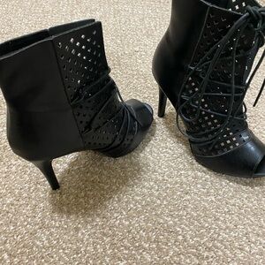 Chic Black Lace-Up Heeled Boots
